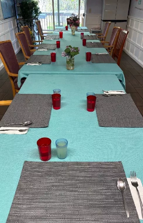 Series of diningroom tables with a country-style plaid tablecloth