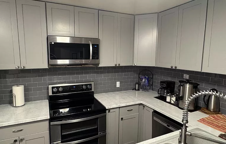 Recently remodeled kitchen with stainless steel appliances